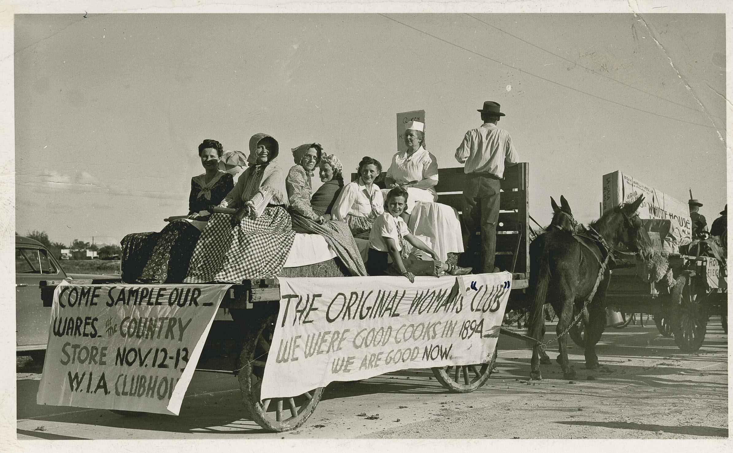 black and white photograph of the Women's Improvement Association parade float